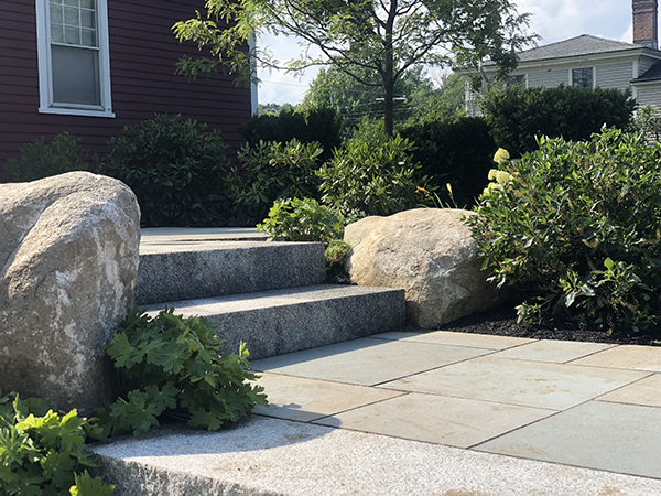 Bluestone walkway with granite steps and landscape boulders by Stone Blossom