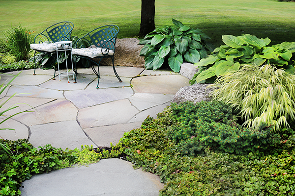 Custom landscape patio with perennial fine gardening in Hollis New Hampshire