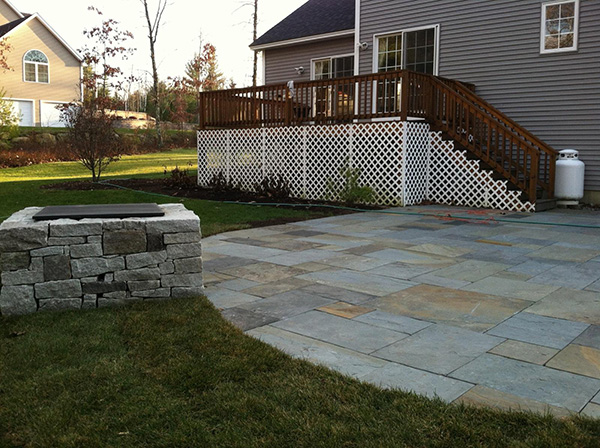 Firepit and patio in Goffstown by New Hampshire landscape company Stone Blossom