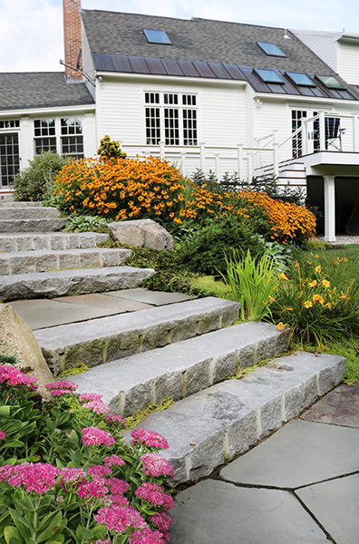Landscape steps with plantings and deck from Stone Blossom