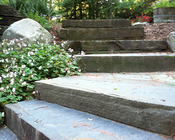 Larege bluestone slabs form a rustic staircase in Bow NH