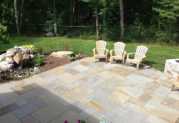 Outdoor living with patio designed by Stone Blossom