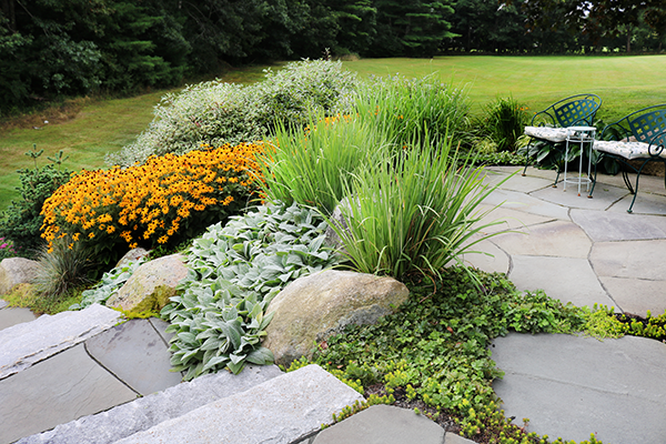 Outdoor space designed by Stone Blossom in Hollis NH
