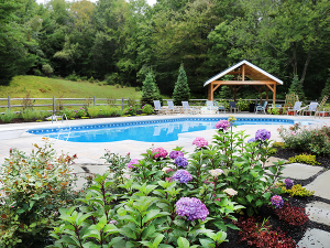 Pool patio and garden plantings in Bow NH