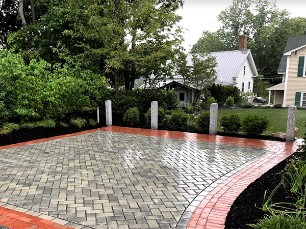 New paved driveway installed by Stone Blosom Landscape and Design