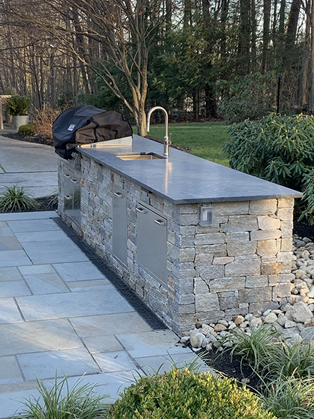 Stone Blossom designed this Outdoor Kitchen in Bedford NH